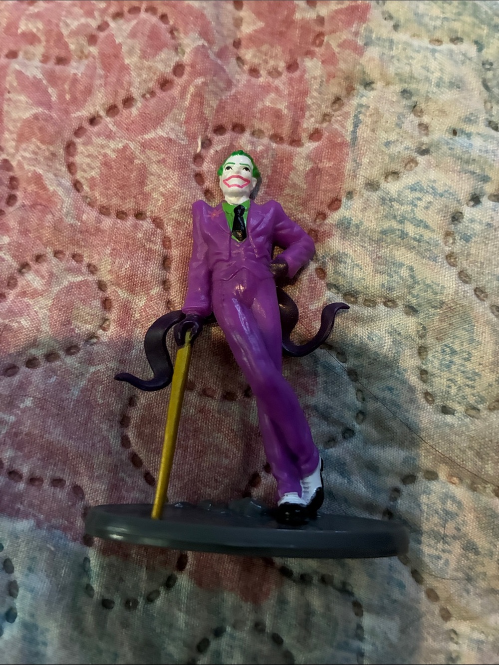 Purple Joker Figurine with Green Hair and Yellow Cane